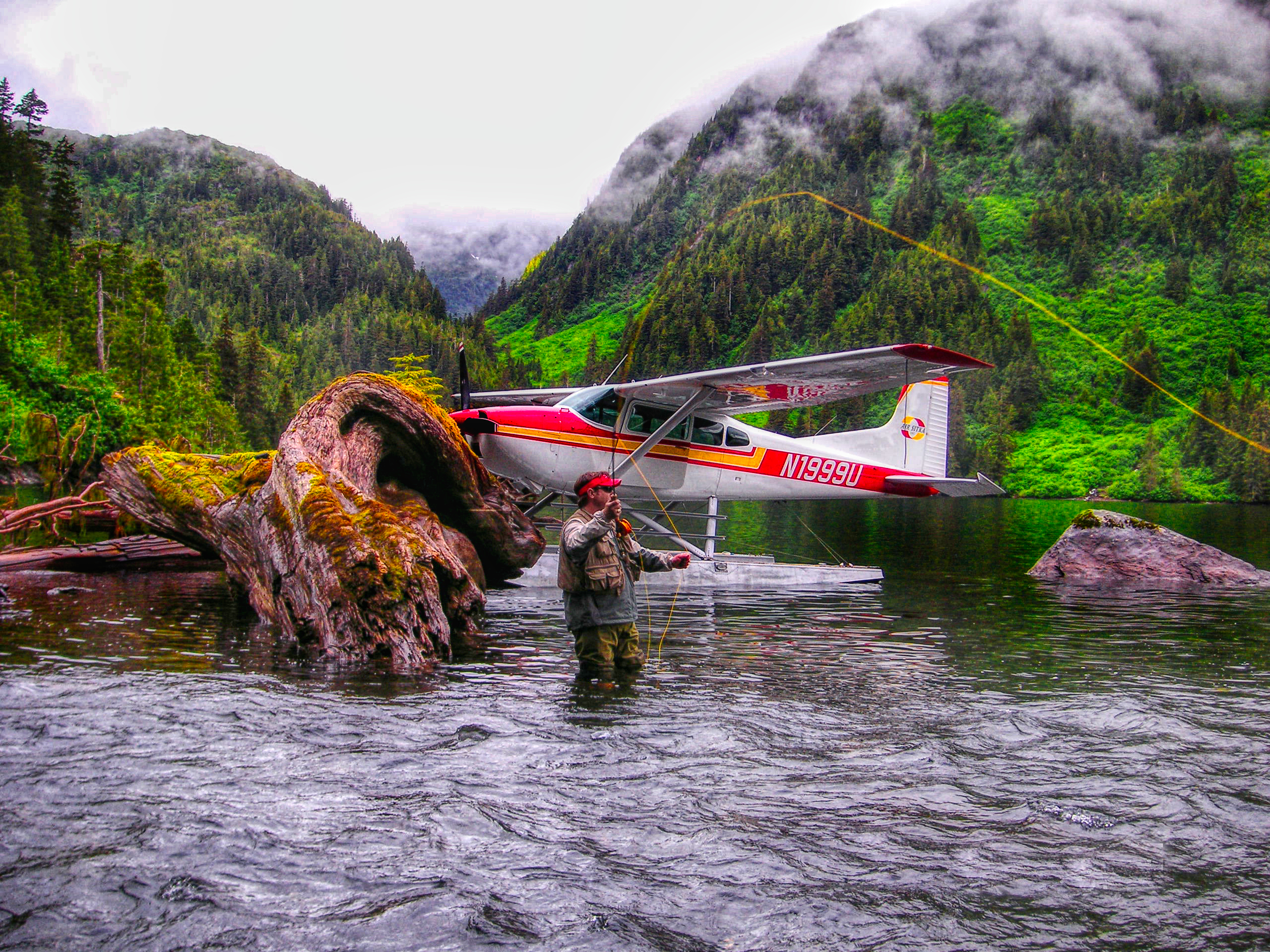 Duane flying his float plane to pick us up after a long day of fresh water  fishing. - Picture of Dove Island Lodge, Sitka - Tripadvisor